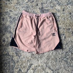 Used pink and black adidas men’s shorts